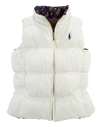 A down-filled puffer vest is rendered in solid channel-quilted microfiber that reverses to a side with a striped collar. A down-filled puffer vest is rendered in solid channel-quilted microfiber that reverses to a side with a striped collar.
