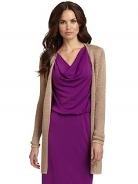 THE LOOKAllover knit constructionOpen frontTie waistTHE FITAbout 34 from shoulder to hemTHE MATERIAL56% rayon/44% cottonCARE & ORIGINDry cleanImportedModel shown is 5'11 (180cm) wearing US size Small. THE LOOKAllover knit constructionOpen frontTie waistTHE FITAbout 34 from shoulder to hemTHE MATERIAL56% rayon/44% cottonCARE & ORIGINDry cleanImportedModel shown is 5'11 (180cm) wearing US size Small.