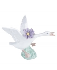 Taking flight with big purple blossoms in tow, this leaping duck captures the grace of nature in lustrous Lladro porcelain. Taking flight with big purple blossoms in tow, this leaping duck captures the grace of nature in lustrous Lladro porcelain.