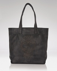 With a laser-cut skull motif, Frye's oversized leather tote adds an edge. Channel your inner biker chic and pair this carryall with hard-hitting moto boots and the sharpest of leather jackets. With a laser-cut skull motif, Frye's oversized leather tote adds an edge. Channel your inner biker chic and pair this carryall with hard-hitting moto boots and the sharpest of leather jackets.