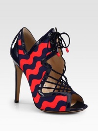 Make waves with this elevated silhouette mixing glossy patent leather with printed satin and soft suede laces. Patent leather-covered heel, 4¾ (120mm)Satin upper with patent leather trim and suede lacesLeather lining and solePadded insoleMade in ItalyOUR FIT MODEL RECOMMENDS ordering one half size up as this style runs small. Make waves with this elevated silhouette mixing glossy patent leather with printed satin and soft suede laces. Patent leather-covered heel, 4¾ (120mm)Satin upper with patent leather trim and suede lacesLeather lining and solePadded insoleMade in ItalyOUR FIT MODEL RECOMMENDS ordering one half size up as this style runs small.