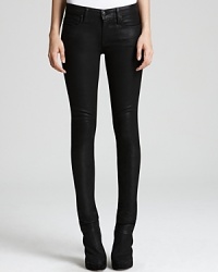 Glossy HELMUT skinny jeans shine the spotlight on your directional style sense for a dose of downtown attitude. Glossy HELMUT skinny jeans shine the spotlight on your directional style sense for a dose of downtown attitude.