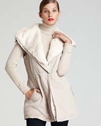 With lush faux-fur lining and a generous silhouette, this Lafayette 148 New York vest gives your style sense a wild sense of adventure. With lush faux-fur lining and a generous silhouette, this Lafayette 148 New York vest gives your style sense a wild sense of adventure.