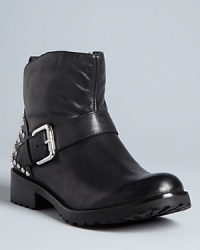 GUESS puts a saucy spin on the moto bootie in this abbreviated design, with a single buckle and studded back to polish up the look. GUESS puts a saucy spin on the moto bootie in this abbreviated design, with a single buckle and studded back to polish up the look.