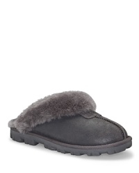 UGG® Australia's flirty, faux fur slippers keep toes cozy. UGG® Australia's flirty, faux fur slippers keep toes cozy.