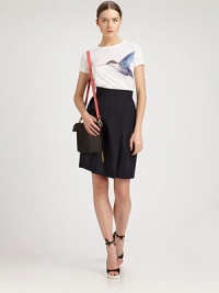 This soft, cotton wrap-style silhouette features subtle pleating at the waist and a banded tab closure.Banded waist with concealed tab closurePleated skirtWraparound styleAbout 22½ longCottonDry cleanMade in Italy of imported fabricModel shown is 5'11½ (181cm) wearing US size 4. This soft, cotton wrap-style silhouette features subtle pleating at the waist and a banded tab closure.Banded waist with concealed tab closurePleated skirtWraparound styleAbout 22½ longCottonDry cleanMade in Italy of imported fabricModel shown is 5'11½ (181cm) wearing US size 4.