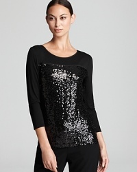 Dripping with decadence, this sequin Calvin Klein top illuminates your day, then ignites the night. Slip it on and prepare to stand out. Dripping with decadence, this sequin Calvin Klein top illuminates your day, then ignites the night. Slip it on and prepare to stand out.