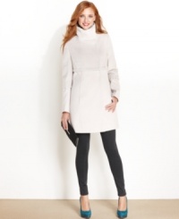 A glamorous mix of fabrics creates a unique look on Tahari's walker coat. A funnel neckline and hidden placket create clean-lined appeal. A glamorous mix of fabrics creates a unique look on Tahari's walker coat. A funnel neckline and hidden placket create clean-lined appeal.