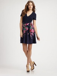 A solid, v-neck top meets a floral, stretch silk skirt with a waist-defining, self-tie belt creating the quintessential dress.V-neckShort sleevesSelf-tie beltFully linedAbout 38 from shoulder to hemTop: 95% cotton/5% elastane; skirt: 92% silk/8% elastaneDry cleanImported Model shown is 5'11½ (181cm) wearing US size Small. A solid, v-neck top meets a floral, stretch silk skirt with a waist-defining, self-tie belt creating the quintessential dress.V-neckShort sleevesSelf-tie beltFully linedAbout 38 from shoulder to hemTop: 95% cotton/5% elastane; skirt: 92% silk/8% elastaneDry cleanImported Model shown is 5'11½ (181cm) wearing US size Small.