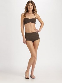 A design that features a ruched front that accentuates the bust.Gathered-front bandeau topRemovable halter strapFully lined80% nylon/20% elastaneHand washImportedPlease note: Bikini bottom sold separately. A design that features a ruched front that accentuates the bust.Gathered-front bandeau topRemovable halter strapFully lined80% nylon/20% elastaneHand washImportedPlease note: Bikini bottom sold separately.