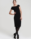 An asymmetrical neckline and draped shoulder shake up the classic T Tahari sheath dress for a strikingly modern silhouette.