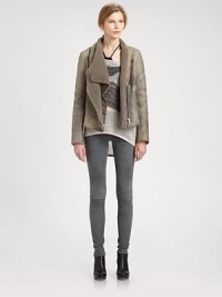 From understated to downtown-chic, this distressed leather jacket finishes the look with dyed shearling trim and a draped front. Dyed shearling collarFront zipper; snap closuresLong sleeves with zippered cuffsDyed shearling liningAbout 25 from shoulder to hemBody: LeatherTrim: Dyed shearlingDry cleanImportedFur origin: SpainModel shown is 5'9 (176cm) wearing US size Small.