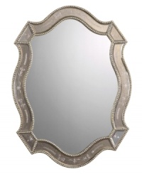 Look to the past. With delicately etched flora and beaded edges in the frame, the shapely Felicie mirror is a study in old-world elegance. An antiqued gold finish adds to its resplendent beauty. Look to the past. With delicately etched flora and beaded edges in the frame, the shapely Felicie mirror is a study in old-world elegance. An antiqued gold finish adds to its resplendent beauty.