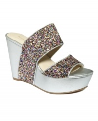 Stunning straps. Nine West's Larysa platform wedge sandals slide on comfortably and are super stylish too. Stunning straps. Nine West's Larysa platform wedge sandals slide on comfortably and are super stylish too.