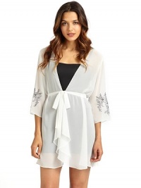 THE LOOKTailored from sheer georgetteWrap front with button closureFront tie waistThree-quarter length sleeves with floral embroidered cuffsTHE FITAbout 33 from shoulder to hemTHE MATERIALPolyesterCARE & ORIGINMachine washImported THE LOOKTailored from sheer georgetteWrap front with button closureFront tie waistThree-quarter length sleeves with floral embroidered cuffsTHE FITAbout 33 from shoulder to hemTHE MATERIALPolyesterCARE & ORIGINMachine washImported