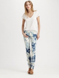 This skinny-fit silhouette goes beyond the blues in chic tie-dyed denim.THE FITSkinny fitRise, about 7Inseam, about 35THE DETAILSZip flyFive-pocket styleSignature stitch back pockets98% cotton/2% elastaneMachine washMade in USA of imported fabricModel shown is 5'10 (177cm) wearing US size 4. This skinny-fit silhouette goes beyond the blues in chic tie-dyed denim.THE FITSkinny fitRise, about 7Inseam, about 35THE DETAILSZip flyFive-pocket styleSignature stitch back pockets98% cotton/2% elastaneMachine washMade in USA of imported fabricModel shown is 5'10 (177cm) wearing US size 4.