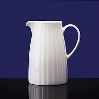 Simple shapes of crisp white are accented with precisely etched lines. Contrasting black matte jasper accessories with glazed interiors are also available. Bone china. Simple shapes of crisp white are accented with precisely etched lines. Contrasting black matte jasper accessories with glazed interiors are also available. Bone china.