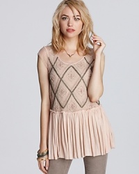 A glamorous holiday is within reach--slip on this Free People top, and spend the season shining in style. A glamorous holiday is within reach--slip on this Free People top, and spend the season shining in style.