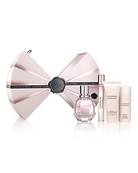 Opulent and full-bodied, Viktor & Rolf Flowerbomb is a floral explosion, a profusion of flowers that has the power to make everything more positive. This holiday, Flowerbomb dresses up in a signature V&R couture bow tie to reveal the sophisticated, feminine floral transformation within this beautiful holiday set.Gift set includes:- 1.7 fl. oz. Eau de Parfum Spray- 0.34 fl. oz. Eau de Parfum Rollerball- 1.7 fl. oz. Bomblicious Body Cream Opulent and full-bodied, Viktor & Rolf Flowerbomb is a floral explosion, a profusion of flowers that has the power to make everything more positive. This holiday, Flowerbomb dresses up in a signature V&R couture bow tie to reveal the sophisticated, feminine floral transformation within this beautiful holiday set.Gift set includes:- 1.7 fl. oz. Eau de Parfum Spray- 0.34 fl. oz. Eau de Parfum Rollerball- 1.7 fl. oz. Bomblicious Body Cream