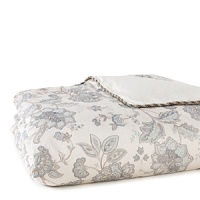 A soft palette and a floral print make this cotton comforter easy on the eyes. Features a striped print on reverse. A soft palette and a floral print make this cotton comforter easy on the eyes. Features a striped print on reverse.