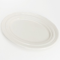 Designed by Olivia Barry for Royal Stafford, this neutral collection features subtle striations that make it easy to mix with your existing dinnerware or elegant on its own. Designed by Olivia Barry for Royal Stafford, this neutral collection features subtle striations that make it easy to mix with your existing dinnerware or elegant on its own.