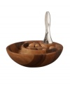Bring new elegance to messy snacks with the Eclipse nut bowl and nutcracker. Acacia wood carved into a double bowl--one for unopened nuts, another for discarded shells--makes pecans, chestnuts and walnuts a pleasure to eat. Designed by Wei Young for Nambe's collection of serveware and serving dishes.