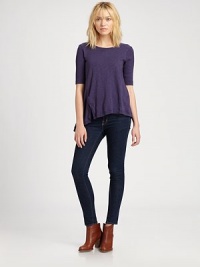 Featherweight cotton go-to modernized by elbow-length sleeves and a split hi-lo hem. RoundneckElbow-length sleevesSplit asymmetrical hemCottonMachine washMade in USAModel shown is 5'10 (177cm) wearing US size Small. Featherweight cotton go-to modernized by elbow-length sleeves and a split hi-lo hem. RoundneckElbow-length sleevesSplit asymmetrical hemCottonMachine washMade in USAModel shown is 5'10 (177cm) wearing US size Small.