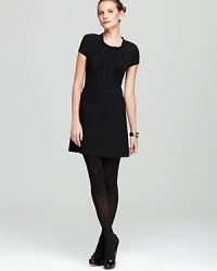 A lovely little black dress from Vince Camuto with a flirtatious sixties silhouette. Just add lipstick for perfect polish. A lovely little black dress from Vince Camuto with a flirtatious sixties silhouette. Just add lipstick for perfect polish.