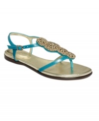 Dainty straps with dramatic decor. The Allik thong sandals by Vince Camuto make a big impact with heavy metallic beading.