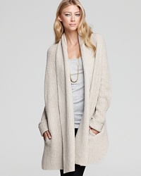Wrap yourself in the cozy warmth of this lofty knit Vince sweater that features a chunky draped scarf overlay--we've never been more excited for fall. Wrap yourself in the cozy warmth of this lofty knit Vince sweater that features a chunky draped scarf overlay--we've never been more excited for fall.