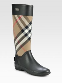 A classic weather essential, pairing the iconic Burberry check on soft canvas with durable rubber. Shaft, 15Leg circumference, 15Canvas and leather upperPull-on styleJersey liningRubber solePadded insoleMade in Italy A classic weather essential, pairing the iconic Burberry check on soft canvas with durable rubber. Shaft, 15Leg circumference, 15Canvas and leather upperPull-on styleJersey liningRubber solePadded insoleMade in Italy