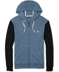 A slim fit and a warm fleece design give this Volcom hoodie its cozy style. A slim fit and a warm fleece design give this Volcom hoodie its cozy style.