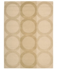 Geometric chic. Enhance your living area with the beautiful look and sheen of Nourison's Elements rug. Hand-loomed of plush wool for incredible texture, the luminous rug features an oversized ring motif across a soft beige background. Geometric chic. Enhance your living area with the beautiful look and sheen of Nourison's Elements rug. Hand-loomed of plush wool for incredible texture, the luminous rug features an oversized ring motif across a soft beige background.