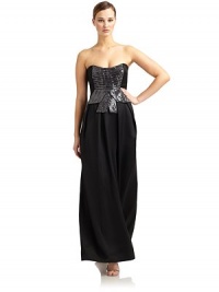 THE LOOKStraplessInterior bustier with boningGeometric beading with draped accentsPleated detailsBack zip closureTHE FITAbout 51 from shoulder to hemTHE MATERIALSilkSilk linedCARE & ORIGINDry cleanMade in ItalyModel shown is 5'10½ (179cm) wearing US size 4. THE LOOKStraplessInterior bustier with boningGeometric beading with draped accentsPleated detailsBack zip closureTHE FITAbout 51 from shoulder to hemTHE MATERIALSilkSilk linedCARE & ORIGINDry cleanMade in ItalyModel shown is 5'10½ (179cm) wearing US size 4.