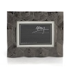 With nods to the beauty of tortoise shell, this convertible frame is a captivating way to display your favorite photos.