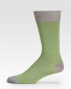 Super soft, with a hint of stretch in neatly striped cotton knit.Mid-calf height80% cotton/20%nylonMachine washImported