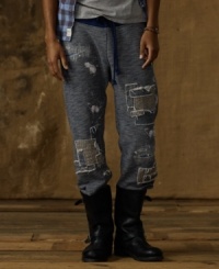 Retaining its rough-and-tough roots with distressed patches and paint splatters, this marled fleece pant proves that causal style can be captivatingly cool. Retaining its rough-and-tough roots with distressed patches and paint splatters, this marled fleece pant proves that causal style can be captivatingly cool.