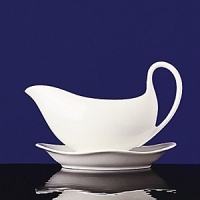 Nothing is more practical and versatile than this hostess' classic. Use it as is or dress it up in glittering metallics or your favorite colors. Bone china. Nothing is more practical and versatile than this hostess' classic. Use it as is or dress it up in glittering metallics or your favorite colors. Bone china.