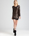 Sequins abound on this Rachel Zoe dress with chic sweater silhouette--the perfect pairing for a winter's night out.