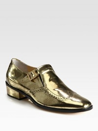 Command attention with this mirrored design of gleaming metallic leather, featuring perforated details and an adjustable buckle strap. Self-covered heel, 1½ (40mm)Metallic leather upperAdjustable buckle strapLeather lining and solePadded insoleMade in ItalyOUR FIT MODEL RECOMMENDS ordering one size up as this style runs small. Command attention with this mirrored design of gleaming metallic leather, featuring perforated details and an adjustable buckle strap. Self-covered heel, 1½ (40mm)Metallic leather upperAdjustable buckle strapLeather lining and solePadded insoleMade in ItalyOUR FIT MODEL RECOMMENDS ordering one size up as this style runs small.