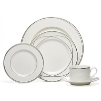 Vows bread & butter plates by Lauren Ralph Lauren Home. Inspired by graceful curves of wedding rings, this elegant dinnerware line features interconnected platinum bands on the finest bone china. Makes a stunning table for any special occasion.