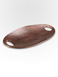 A striking tray in antique copper-plated alloy features the slight irregularities that define handcrafted accents such as these. And with small handles on the sides, it's as convenient as it is elegant. From the Heritage Pebble CollectionAntique copper-plated alloy18W X 10LWipe cleanImported A striking tray in antique copper-plated alloy features the slight irregularities that define handcrafted accents such as these. And with small handles on the sides, it's as convenient as it is elegant. From the Heritage Pebble CollectionAntique copper-plated alloy18W X 10LWipe cleanImported