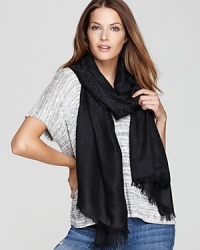 Flaunt signature style with this Tory Burch logo scarf in a luxe silk and cotton blend. Flaunt signature style with this Tory Burch logo scarf in a luxe silk and cotton blend.