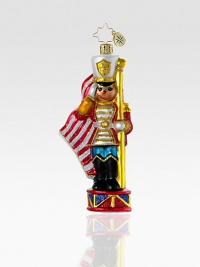 Display your support for troops past and present with this toy soldier of glitter-dusted, handcrafted glass. A portion of the proceeds will benefit Veteran's Awareness. Hand-blownHand-painted5 highMade in Poland Display your support for troops past and present with this toy soldier of glitter-dusted, handcrafted glass. A portion of the proceeds will benefit Veteran's Awareness. Hand-blownHand-painted5 highMade in Poland