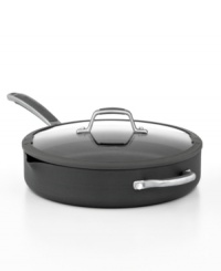 Easy cook, easy go! Perfect for prep, this hard-anodized aluminum vessel features etched interior fill lines that measure dry & wet ingredients to cut the guesswork out of cooking. Plus with convenient pour spouts and a tight-fitting tempered glass lid with silicone rim & built-in drain holes, this sauté pan guarantees less mess & more ease. Lifetime warranty. Easy cook, easy go! Perfect for prep, this hard-anodized aluminum vessel features etched interior fill lines that measure dry & wet ingredients to cut the guesswork out of cooking. Plus with convenient pour spouts and a tight-fitting tempered glass lid with silicone rim & built-in drain holes, this sauté pan guarantees less mess & more ease. Lifetime warranty.