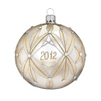 Artfully crafted by hand of blown glass in traditional shades of green, red, silver and gold, these Waterford ornaments add nostalgic warmth and sparkle to the holiday tree.