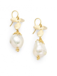 THE LOOKWhite baroque pearl detailsFlower accents with leaf setting18k yellow goldplated brassEar wireTHE MEASUREMENTLength, about 1.5ORIGINMade in USA THE LOOKWhite baroque pearl detailsFlower accents with leaf setting18k yellow goldplated brassEar wireTHE MEASUREMENTLength, about 1.5ORIGINMade in USA