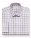 A sophisticated plaid pattern adds a subtly refined touch to the workweek with this dress shirt from Michael Kors.