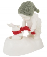 A tiny baby offers his scarf to a friend in need in this Snowbabies figurine. Crafted of porcelain bisque from Department 56. A tiny baby offers his scarf to a friend in need in this Snowbabies figurine. Crafted of porcelain bisque from Department 56.