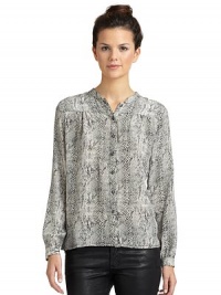 THE LOOKAllover contrasting animal printButton-frontLong sleeves with barrel cuffsTHE FITAbout 24 from shoulder to hemTHE MATERIALSilkCARE & ORIGINDry cleanMade in USAModel shown is 5'9 (175cm) wearing US size Small. THE LOOKAllover contrasting animal printButton-frontLong sleeves with barrel cuffsTHE FITAbout 24 from shoulder to hemTHE MATERIALSilkCARE & ORIGINDry cleanMade in USAModel shown is 5'9 (175cm) wearing US size Small.